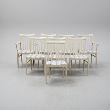 A dining table with two armchairs and six chairs by Carl Malmsten for Bodafors.