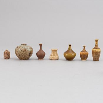 A set of 21 stoneware miniature vases and a bowl, including Höganäs.