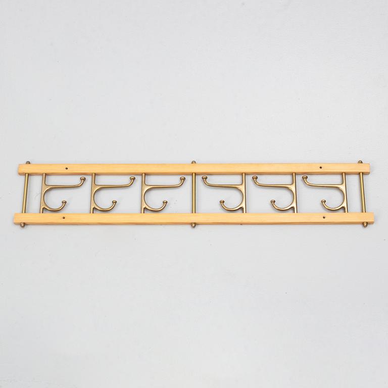 A 'Dekorativ' coat hanger, Skoglunds metallgjuteri, Anderstorp, 1950s/60s.
