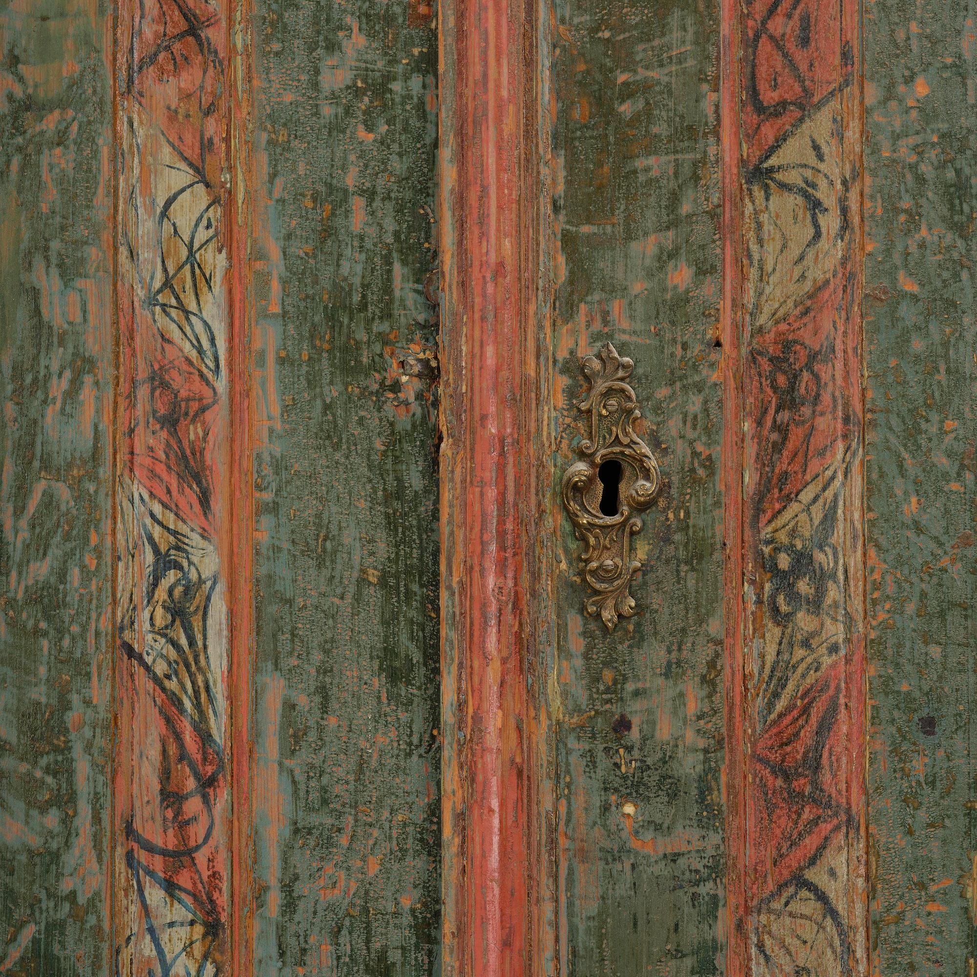 A Swedish polychrome-painted rococo cabinet, late 18th century.