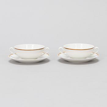 A Royal Copenhagen 'Tunna' porcelain broth bowl set for twelve, with saucers, Denmark 1957.