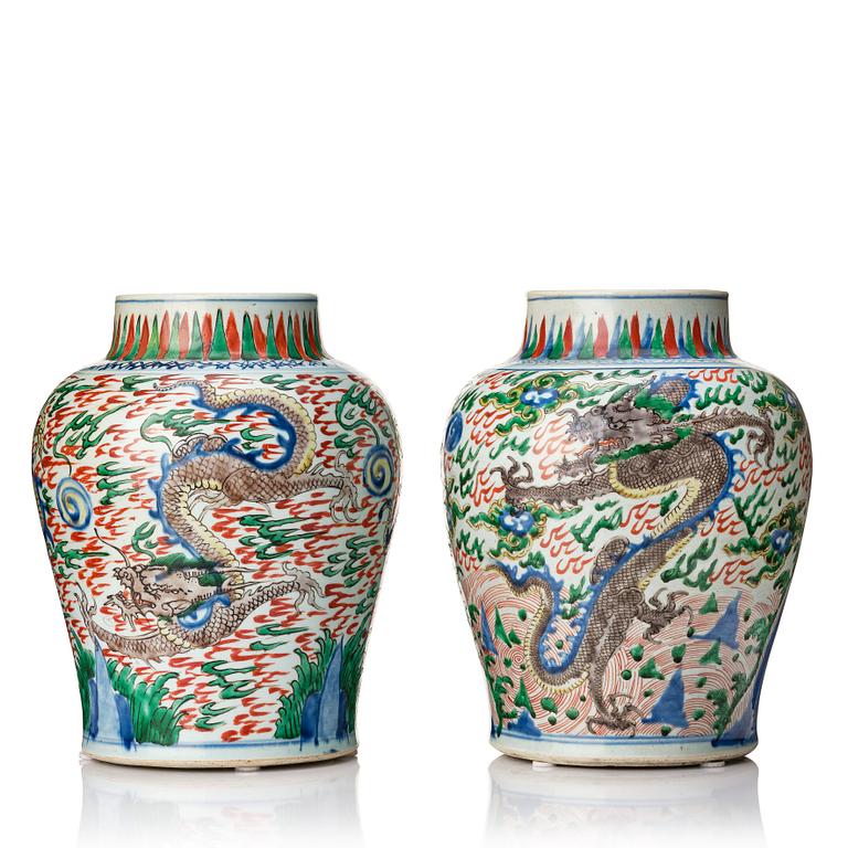 A matched pair of Transitional Wucai jars, 17th Century.