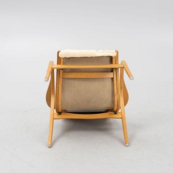 Yngve Ekström, a "Lamino" armchair, Swedese.