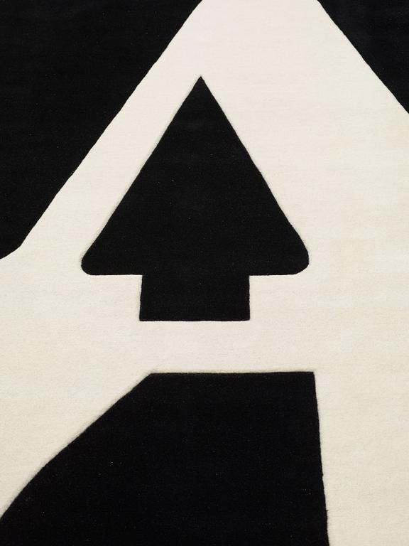 Robert Indiana, CARPET. "White on Black", Chosen Love. Hand tufted in 1995. 303 x 306 cm. Robert Indiana.