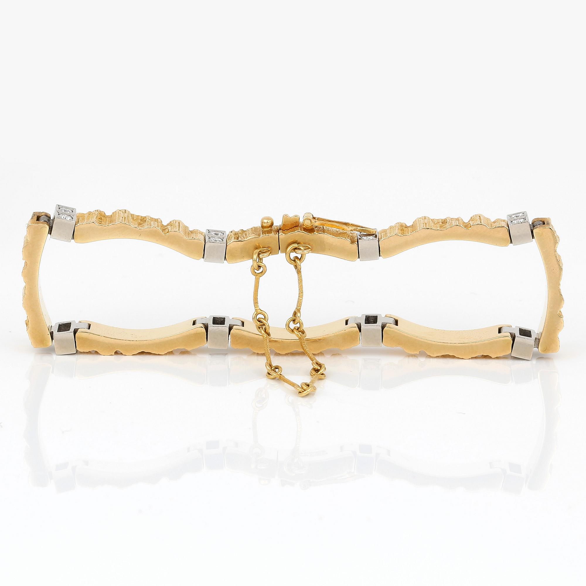 ARMBAND, 18K guld, 16 diamanter, Lapponia, 1984. Vikt ca 30g.