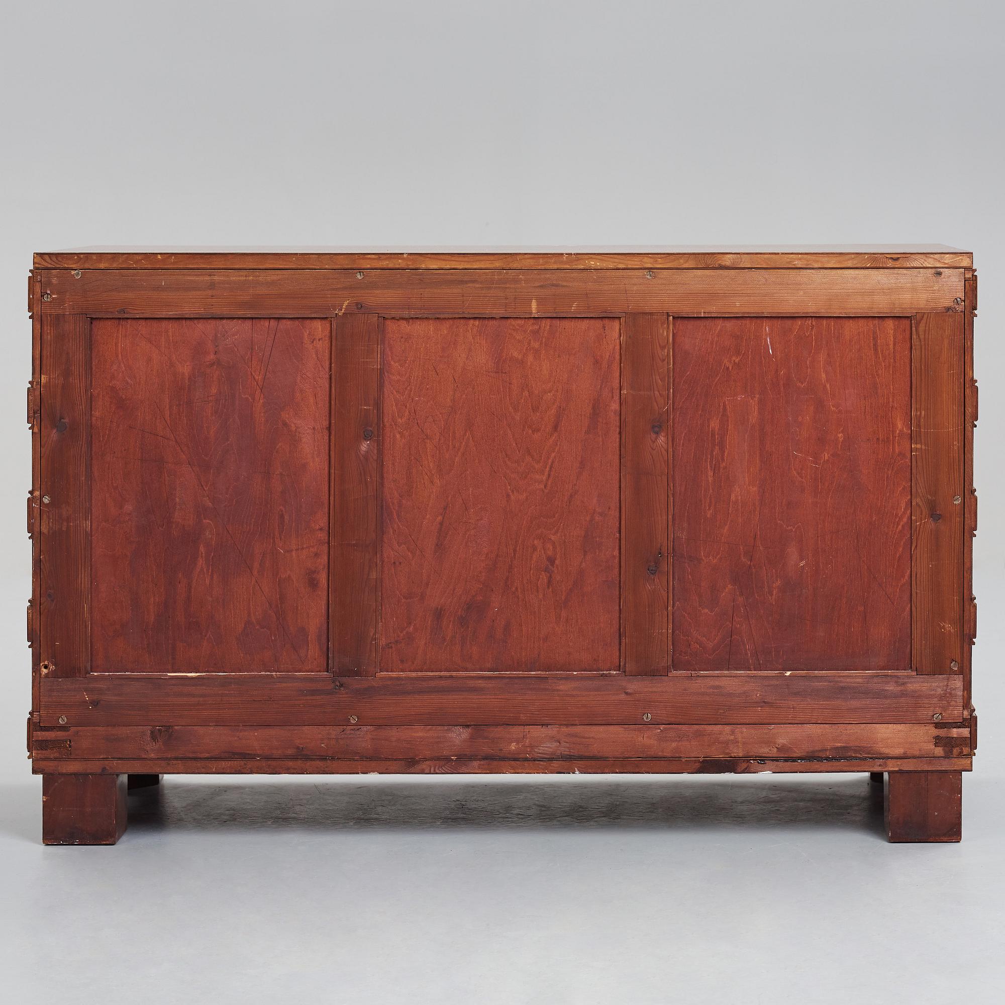 Oscar Nilsson, attributed to, a mahogany chest of drawers, Sweden 1930's.