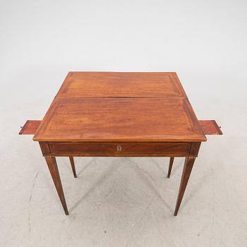 A late Gustavian mahogany game table first half of the 19th century.