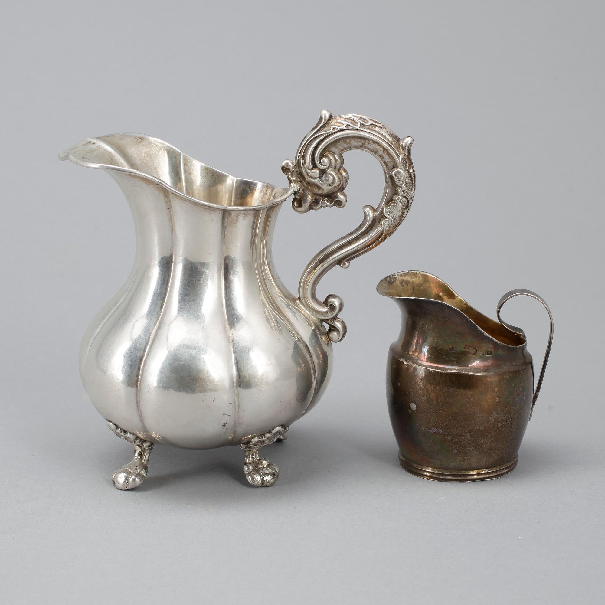 GRÄDDKANNOR, 2 st, silver, Lars Larson & Co, Göteborg, 1800-talets andra hälft. Vikt ca 167g.