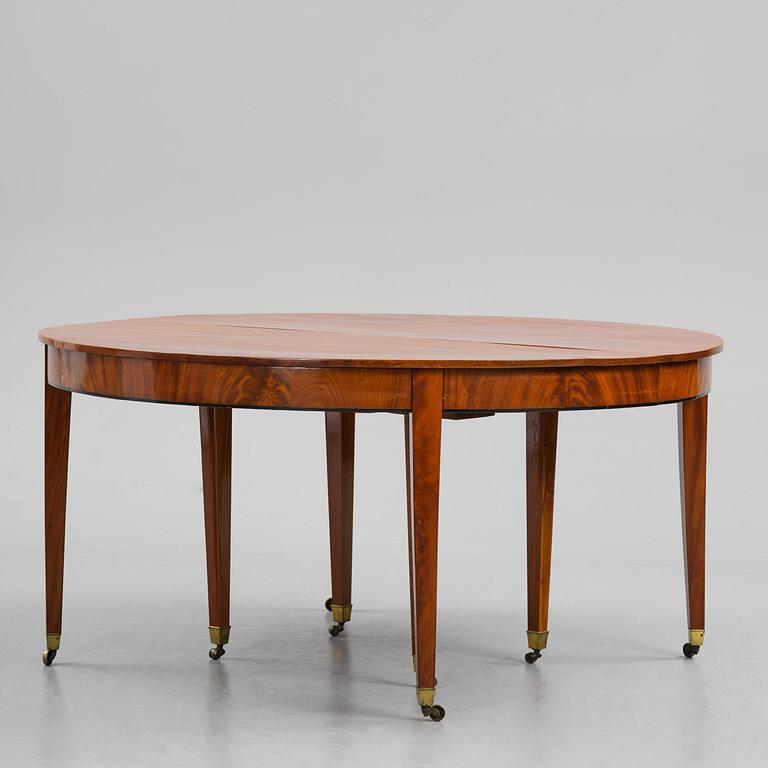 A George III mahogany D-end dining table, circa 1800.