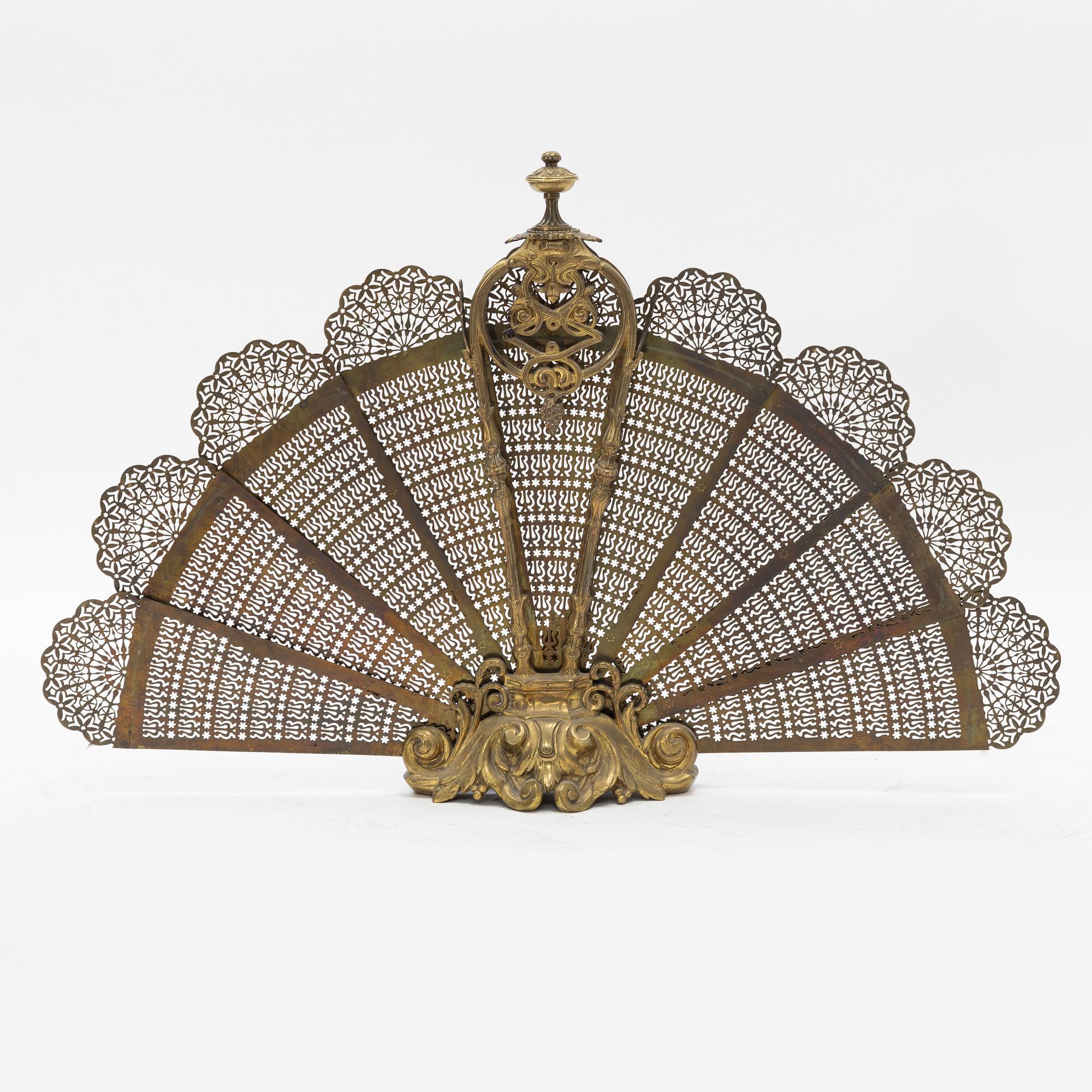 A brass fire grid, early 20th century.