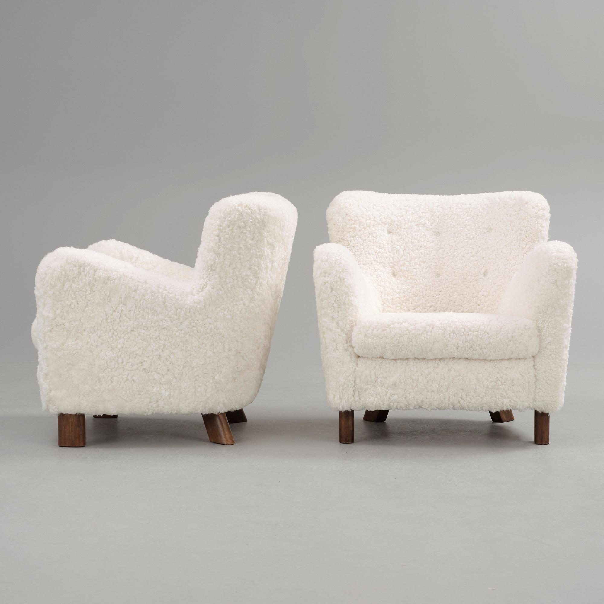 A pair of Fritz Hansen 'Model 1669' armchairs, Denmark.