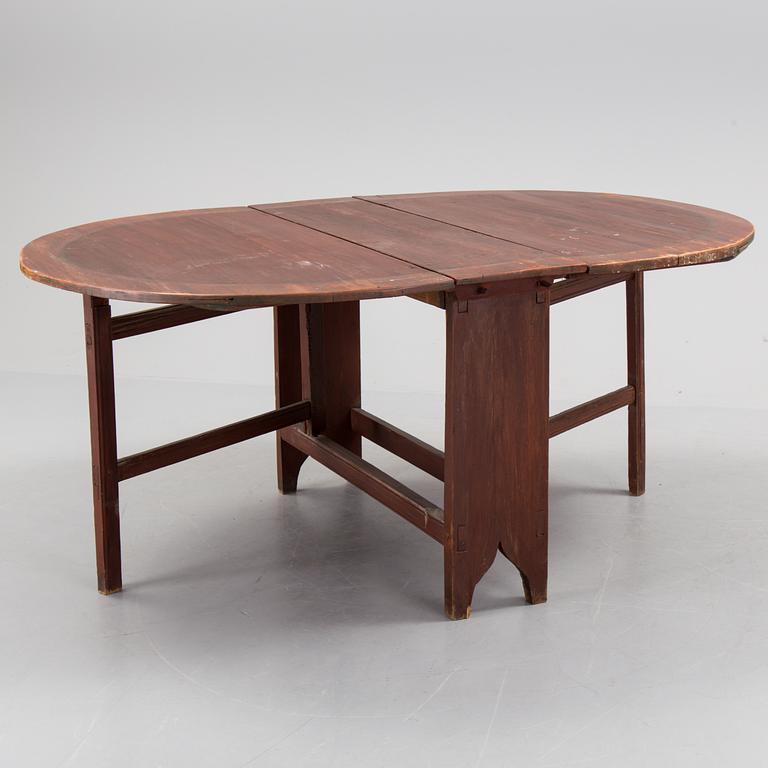 A 19th century painted flap table.