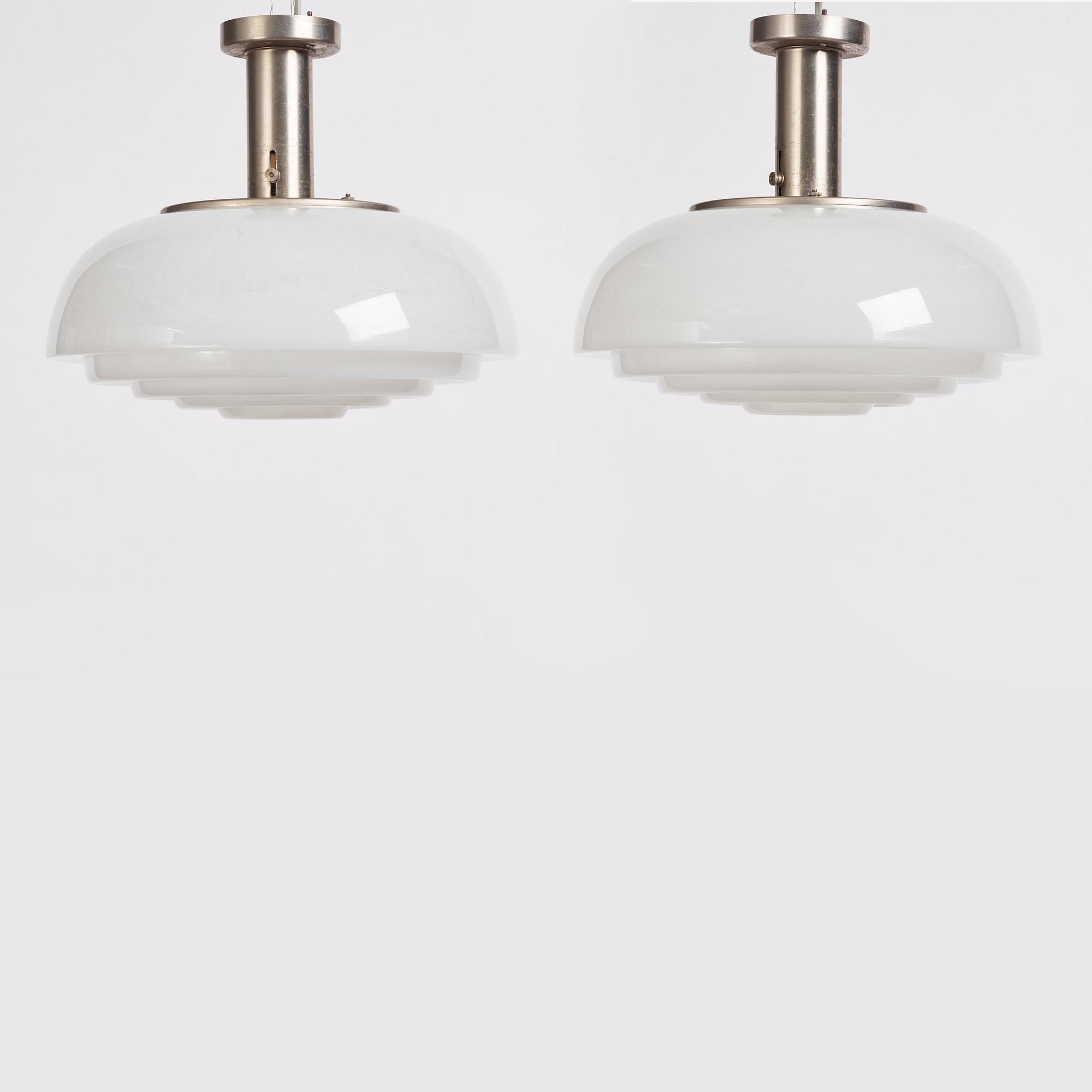 Harald Notini, a pair of ceiling lamps, model "11321", Arvid Böhlmarks Lampfabrik, 1940s.