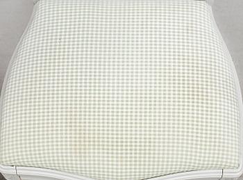 A Gustavian style dining table and ten chairs, 20th century.