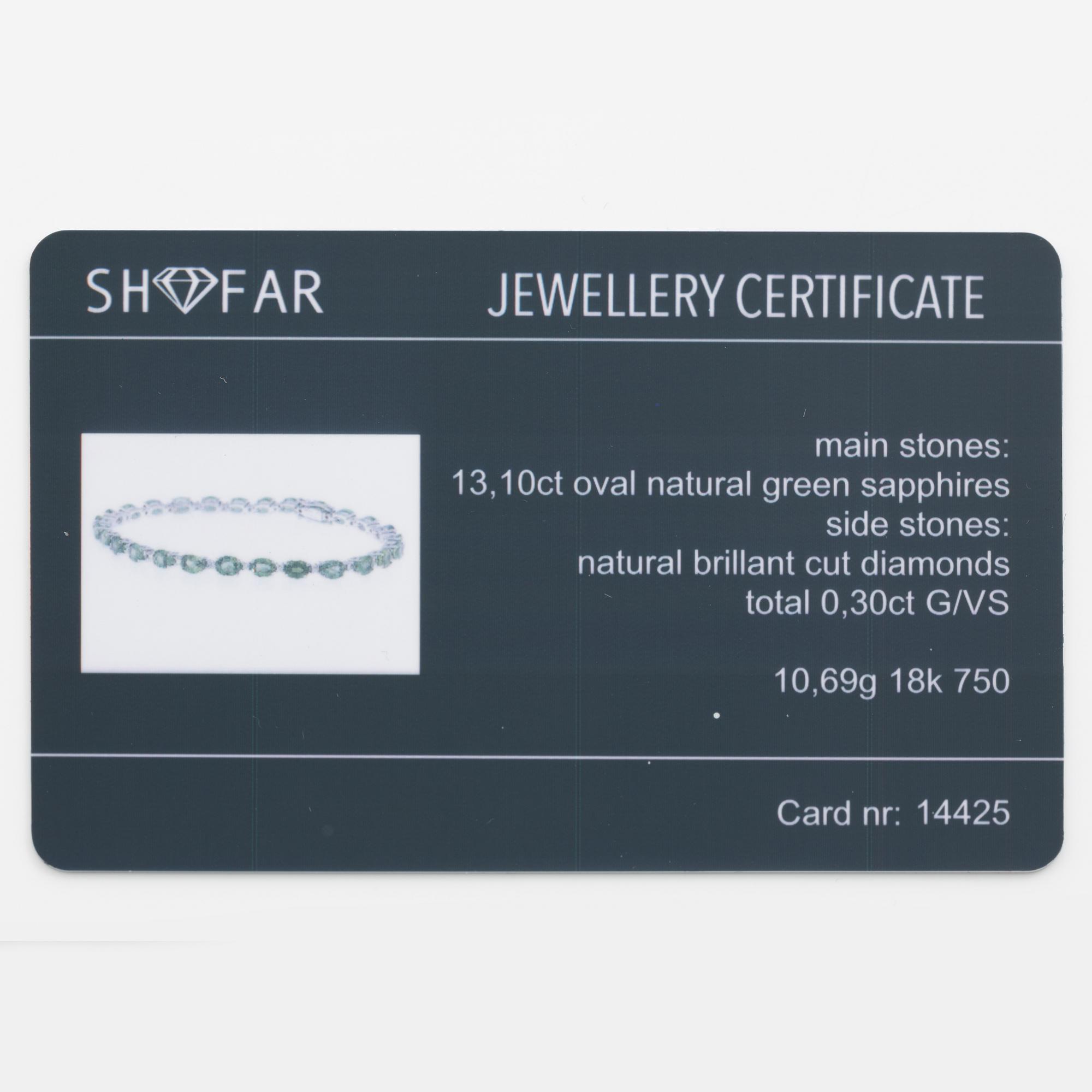 Bracelet 18K white gold with green sapphires and brilliant-cut diamonds.