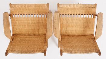 Hans J. Wegner, a pair of oak and rattan 'CH27' chairs, Carl Hansen & Søn, Odense Denmark 1950s-1960s.