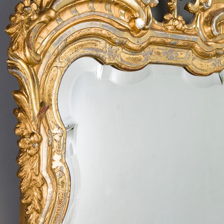 Johan Åkerblad, a giltwood Rococo mirror, signed and dated in Stockholm 1776.