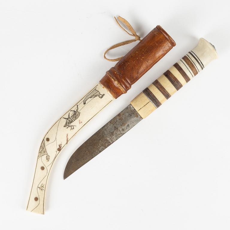 A reindeer horn knife, signed AL.