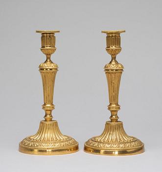 A pair of candlesticks, Louis XVI-style, circa 1900.