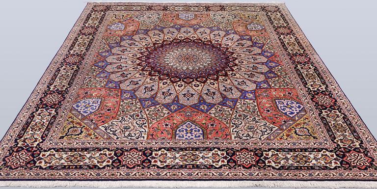 A Tabriz carpet, part silk, so-called 50 Raj, approx. 255 x 200 cm.