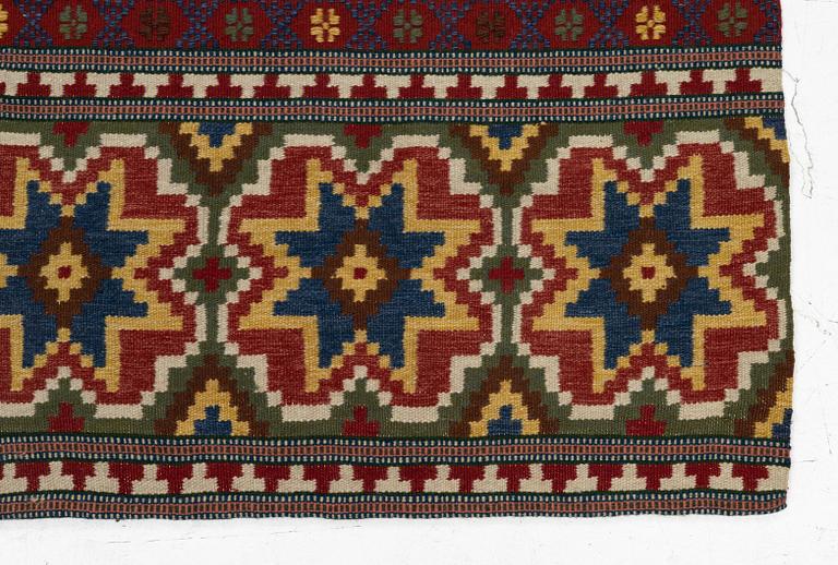 A bench cushion, flat weave, c. 262 x 64 cm, Scania, around the year 1900.