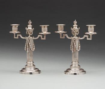 A pair of Fabergé, silver candelabra, workmaster Julius Rappoport, S.t Petersburg before 1899.