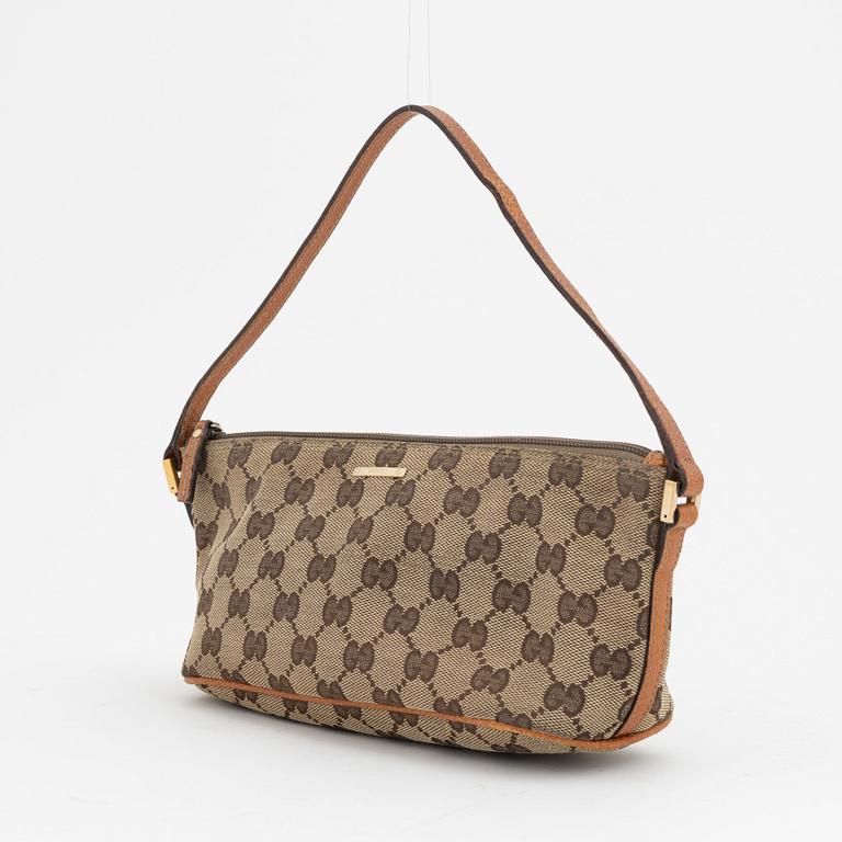 Gucci, a monogram canvas bag.