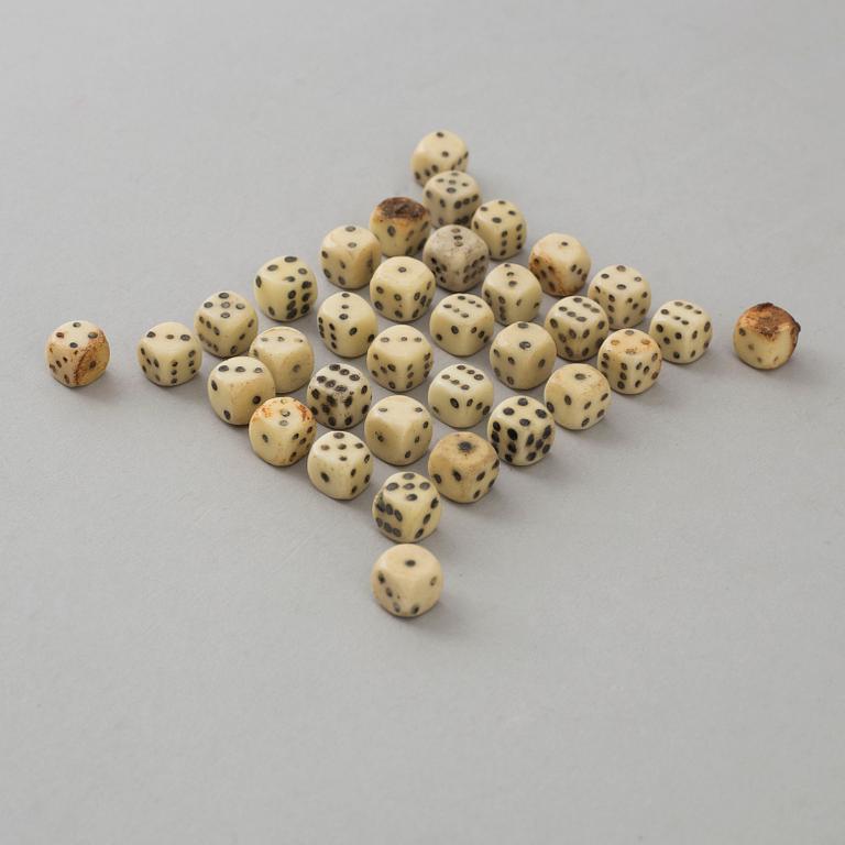 A set of 34 bone dice, 19th century.