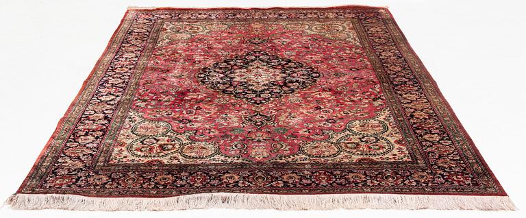 A Carpet, Silk Gohm, circa  298 x 202 cm.