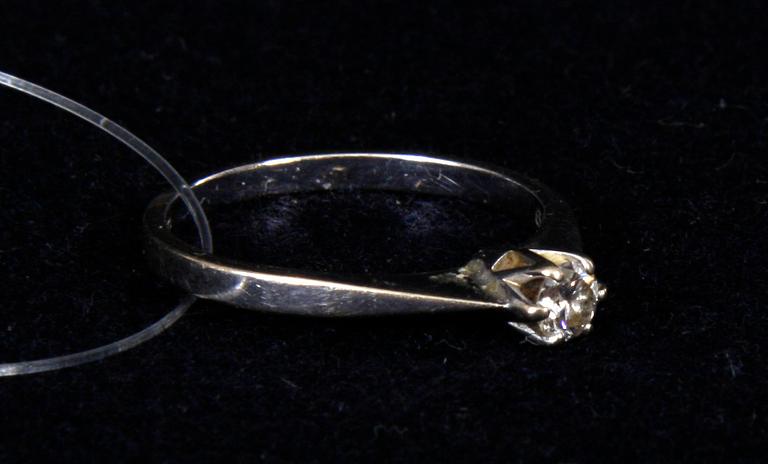 RING, 18K vitguld och briljant 0,19 ct enl gravyr.