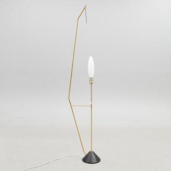 A mid-20th Century floor lamp.