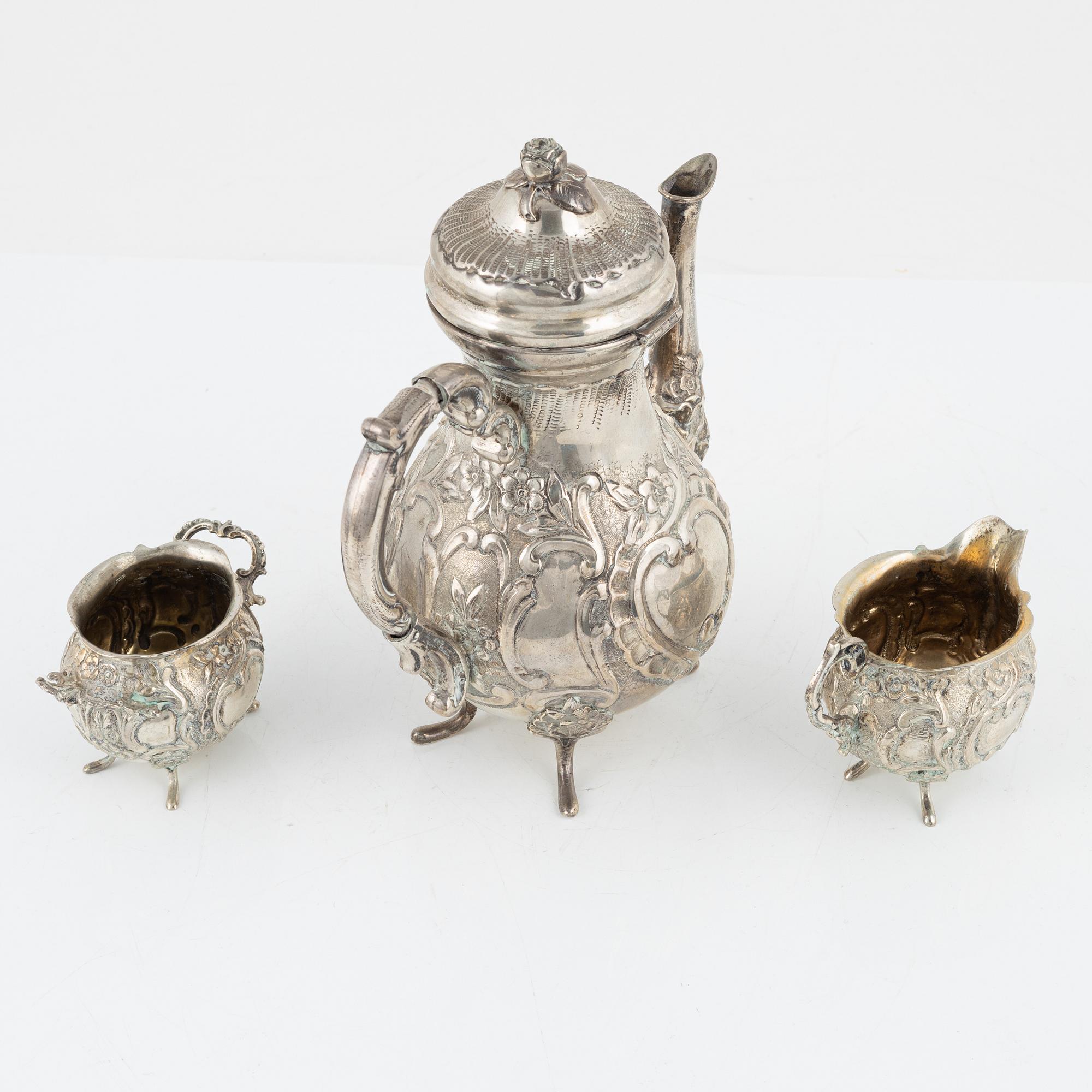 A three-piece Rococo style silver coffee set, possibly Norway, mid 20th century.