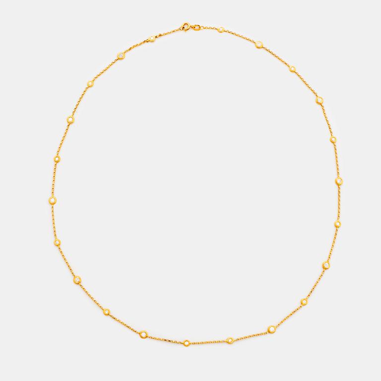 Collier 18K guld med runda briljantslipade diamanter.