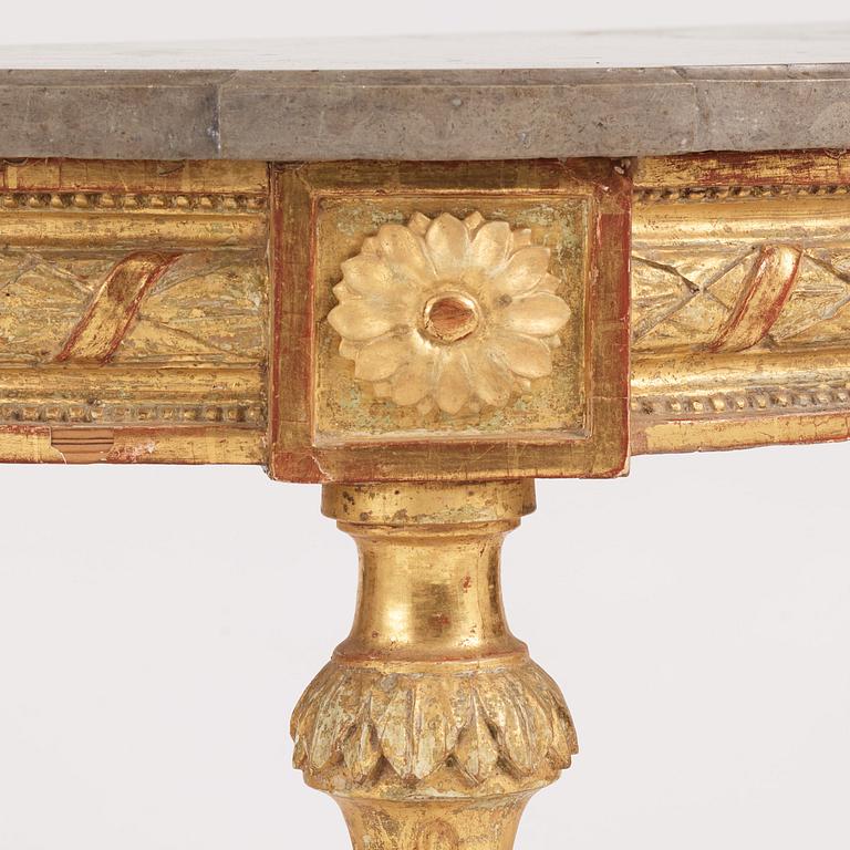 A Gustavian carved giltwood console table, late 18th century.