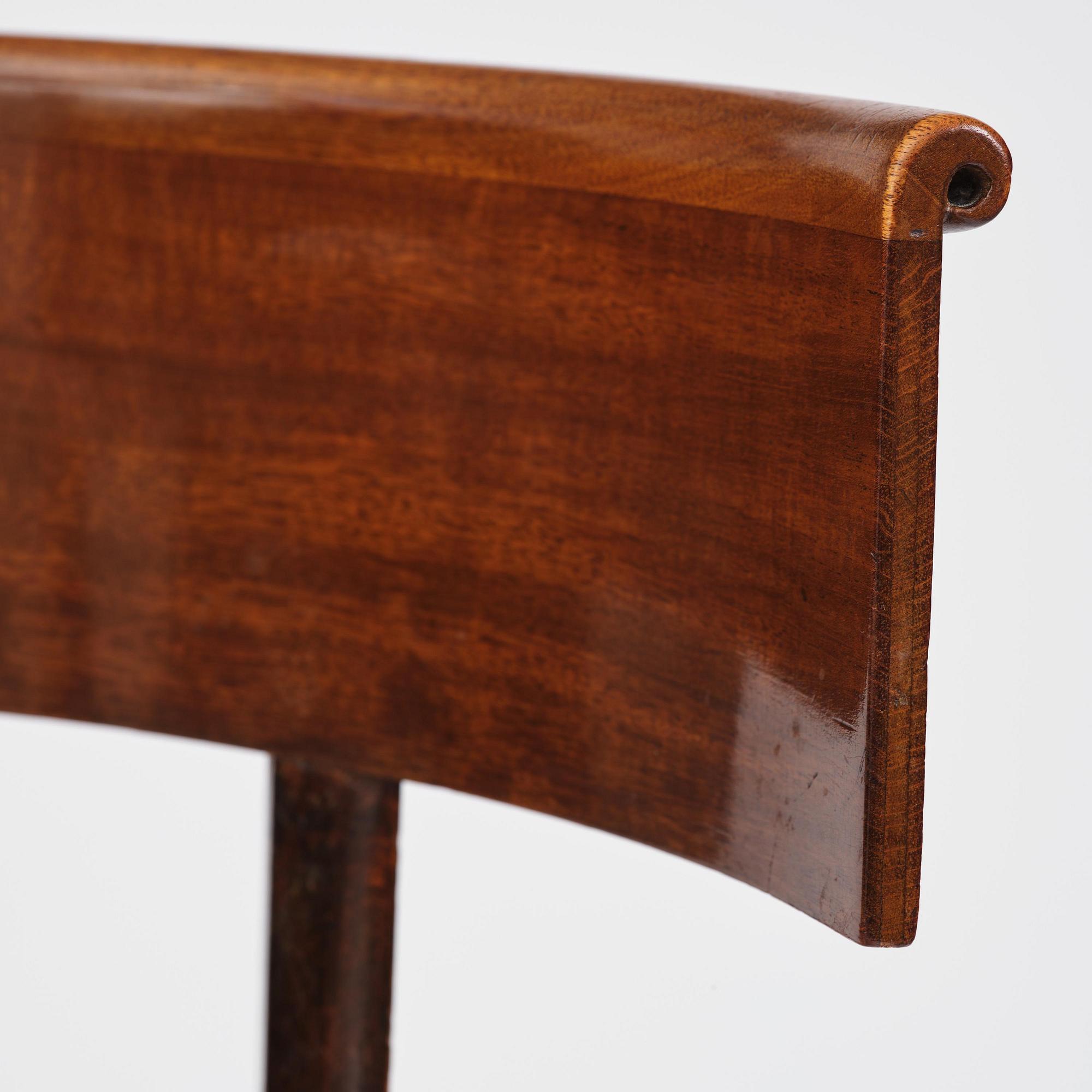 A set of six Danish Empire mahogany 'Klismos' chairs, Copenhagen, early 18th century.