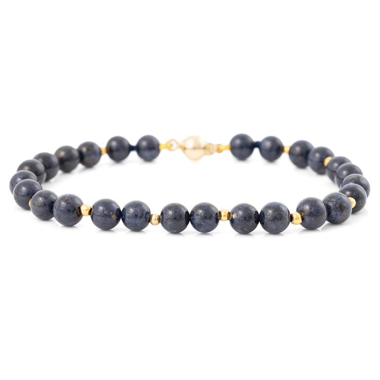 Bracelet with blue stones and 18K gold clasp.