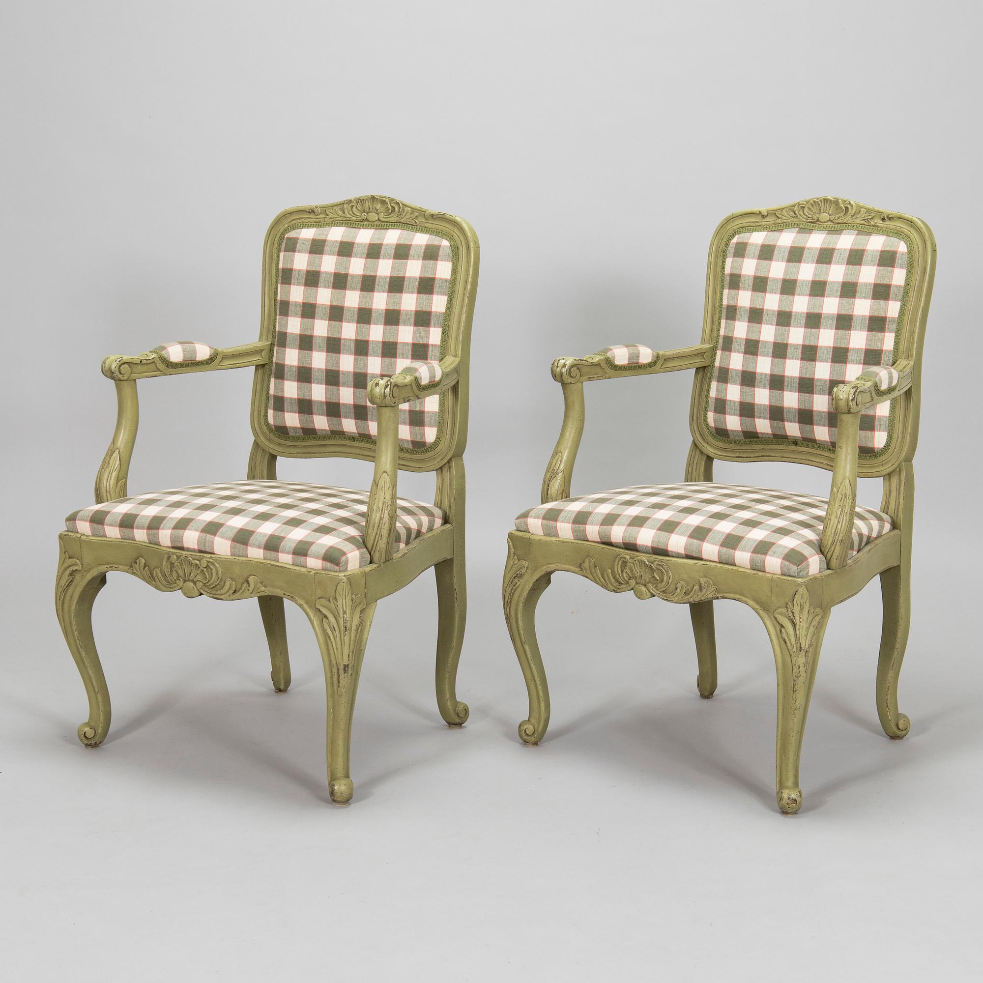 A pair of 20th century  Rococo style armchairs.
