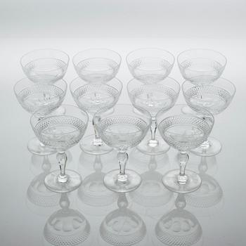 Eleven glass champagne cups, around mid 20th century.