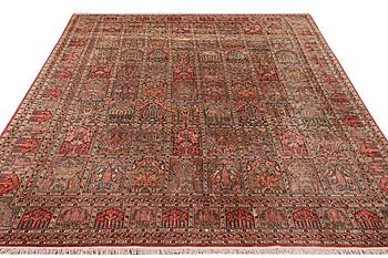 A carpet, silk Kashmir, ca 428 x 299 cm.