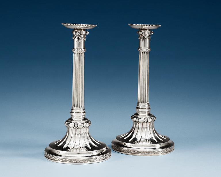 A PAIR OF SWEDISH SILVER CANDLESTICKS, Makers mark of Lars Hessling, Linköping 1784.