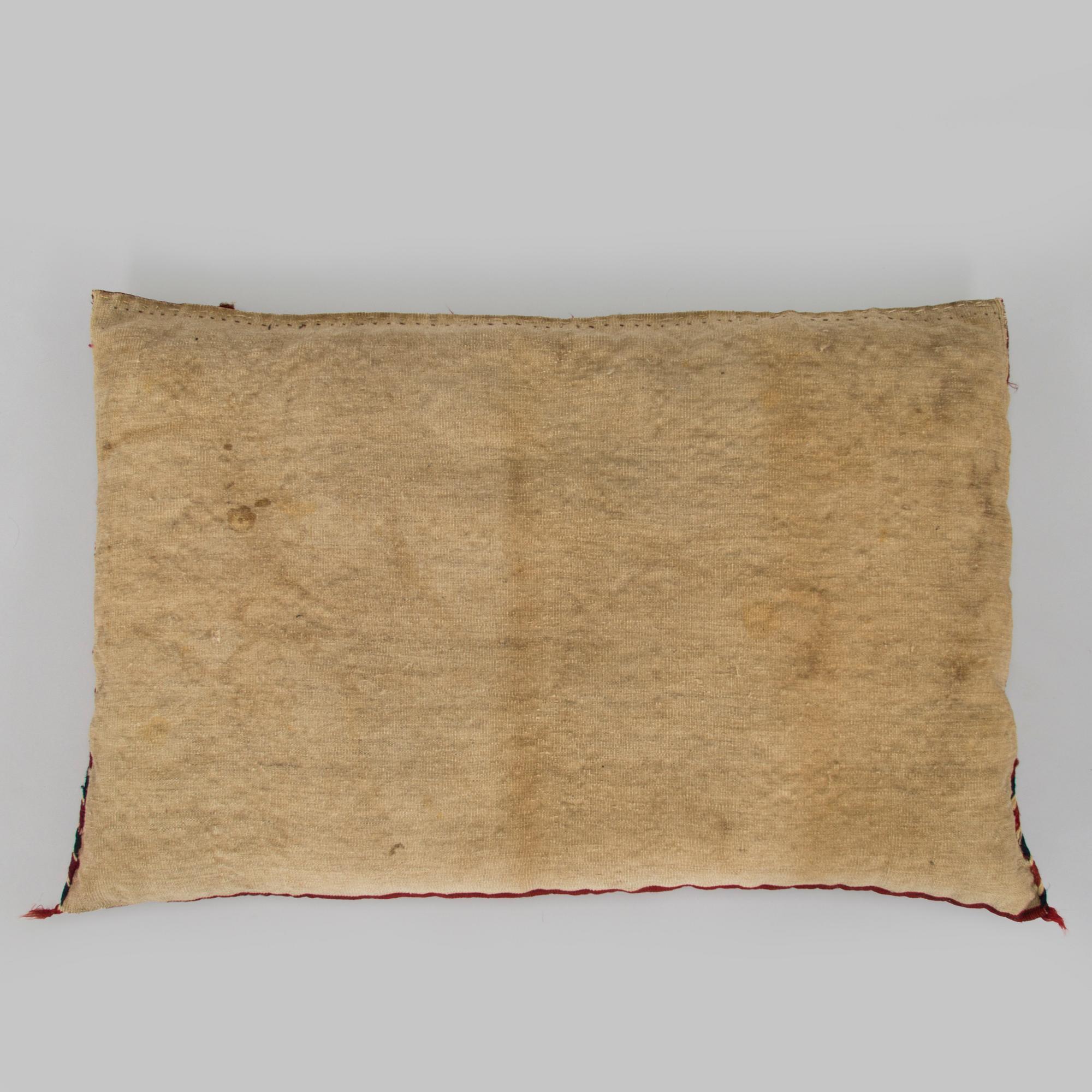 Two presumably antique Turkmenistan Yomud cushions/bag fronts.