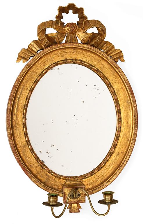 A late Gustavian two-light girandole mirror.