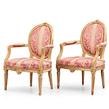 71. A matched pair of Gustavian late 18th cenury armchairs.