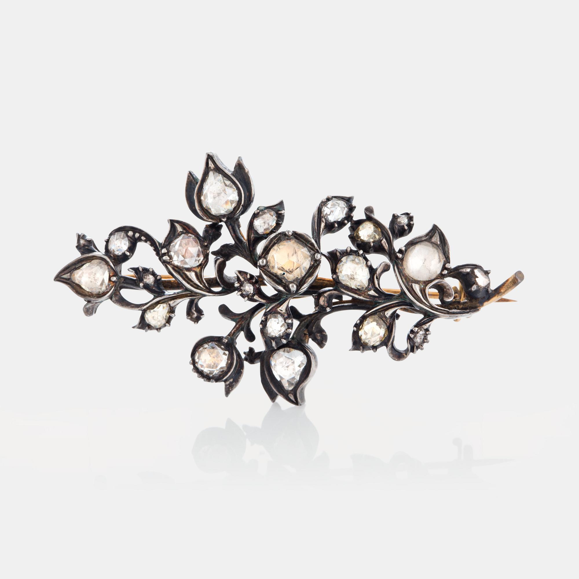 Brosch med rosenslipade diamanter.