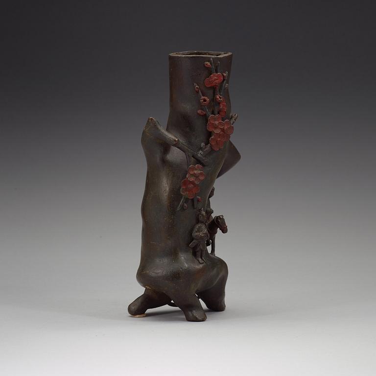 A bronze three trunk shaped vase, Qing dynasty (1644-1912).