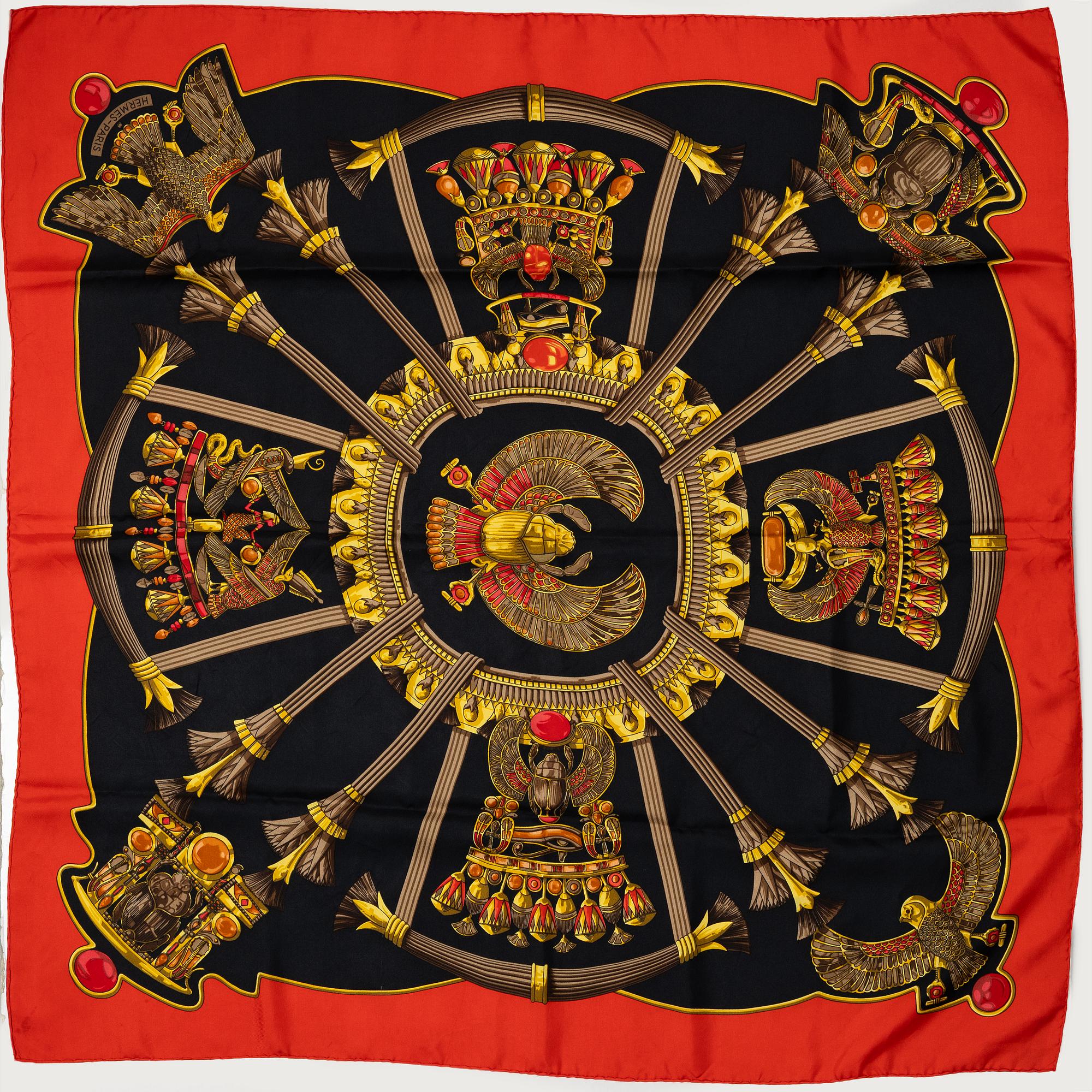 Hermès, a 'Egypte - Scarabées et Pectoraux' scarf.