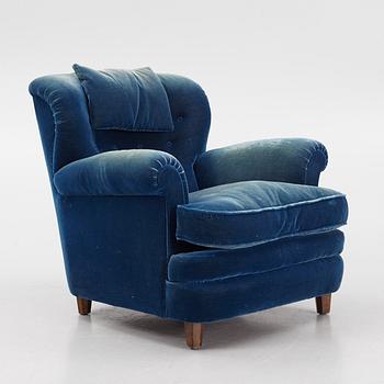 Josef Frank, a model 336 lounge chair for Firma Svenskt Tenn.