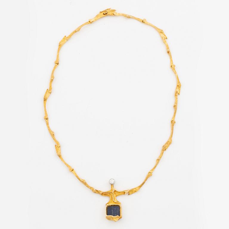 Lapponia necklace 18K gold with spectrolite and brilliant-cut diamond, 1976.