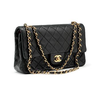 551. CHANEL, a quilted blue leather "Double Flap" shoulder bag.