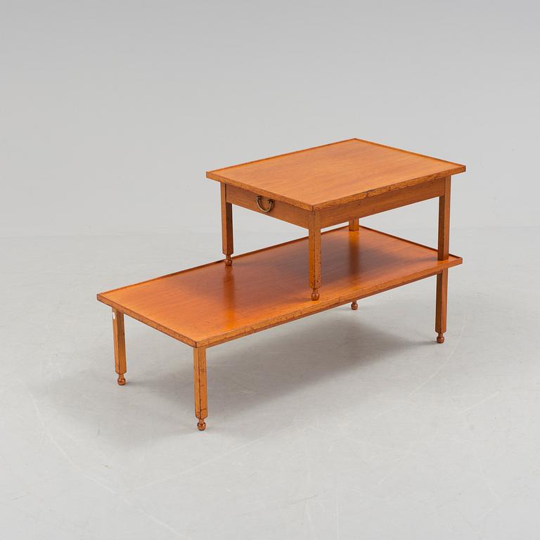 A mahogany sidetable model 1073 by Josef Frank for Firma Svenkt Tenn.